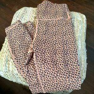 Two pairs of full length leggings both size x small